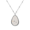 Elevate Your Style with the Unique 'Let It Be' Oval Necklace